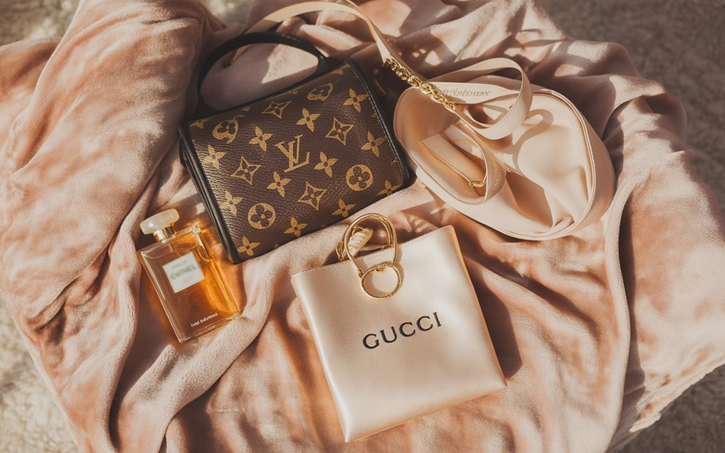Luxury fashion gifts for wife including designer accessories and perfume.