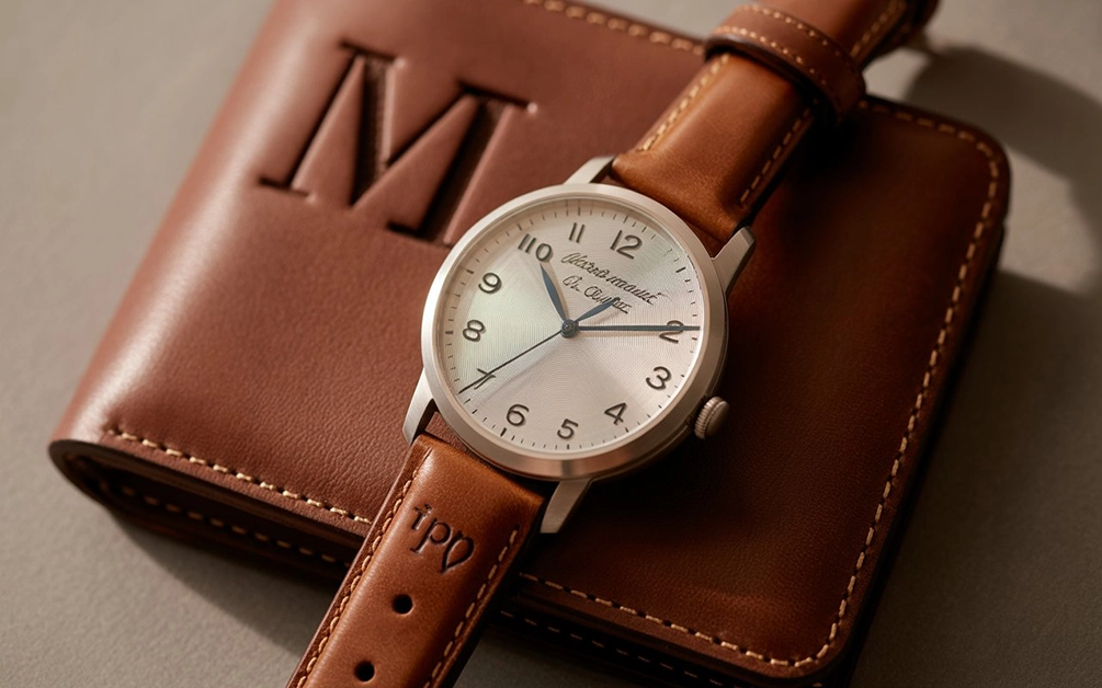 A personalized and sentimental gift idea, such as a custom family portrait or engraved watch, thoughtfully presented.